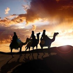 The Three Wise Men travel through the desert on their journey to the birth of Christ